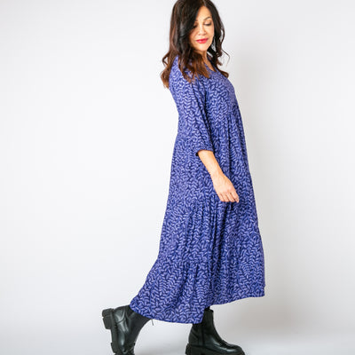 The navy blue Hazel Patterned 3/4 Sleeve Dress with a tiered skirt in a maxi length 