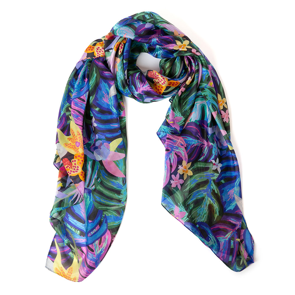 The Hibiscus Flower Silk Scarf with hints of purple blue green yellow and black