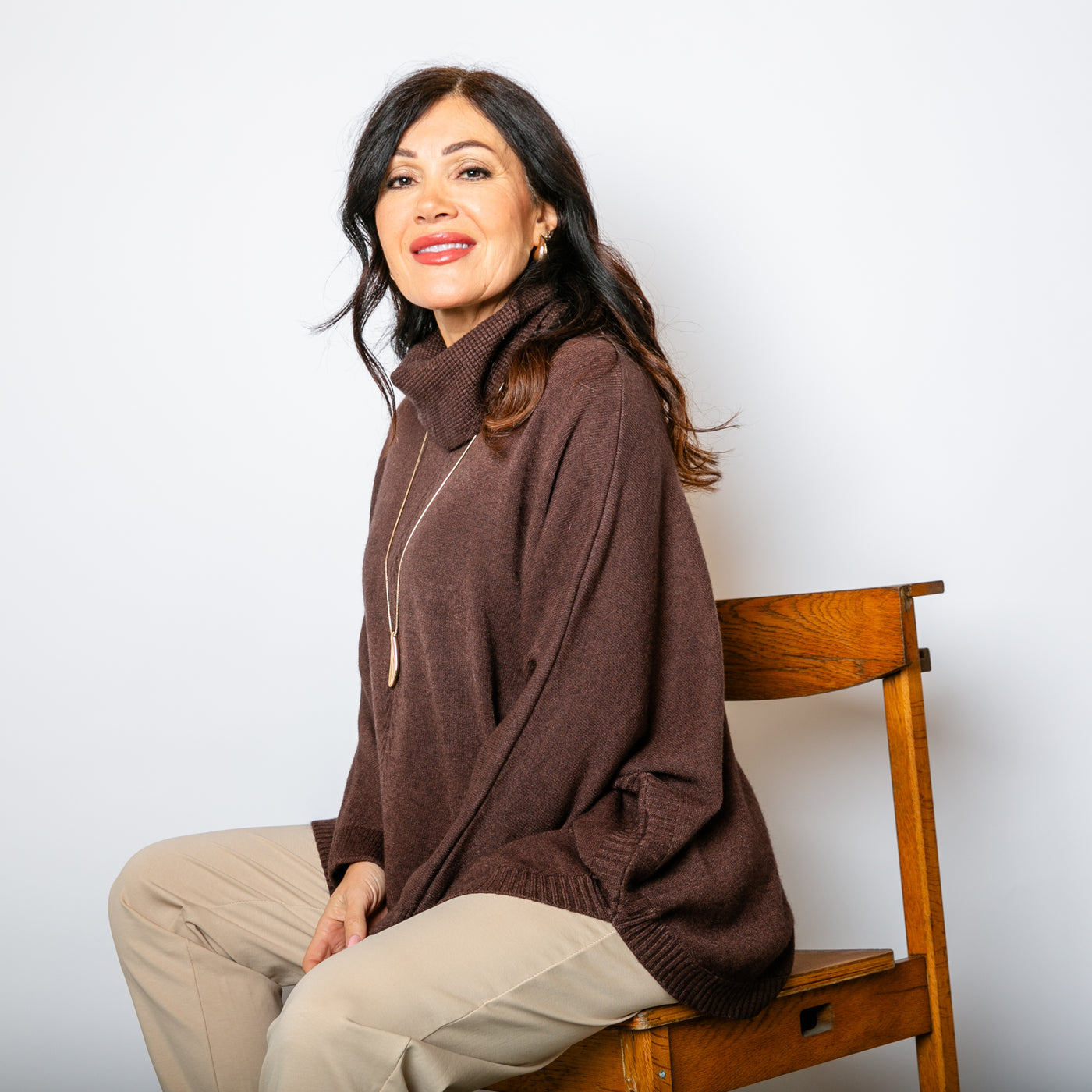 The High Neck Relax Fit Jumper in chocolate brown with long sleeves