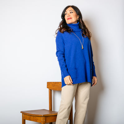  The royal blue High Neck Two Pocket Jumper made from a super soft stretchy knitted material