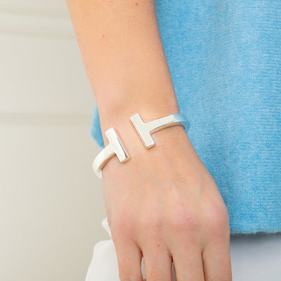 The silver Honey Cuff Bangle which makes a great accessory for dressing up an outfit