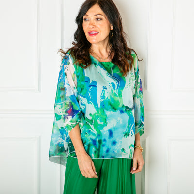 The turquoise green blue Ink Blot Blouse with a round neckline and big dropped sleeves
