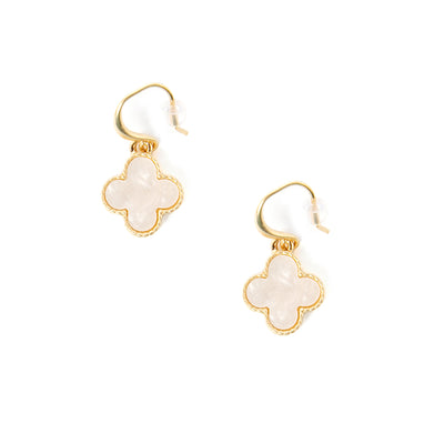 The white Ivy Earrings in a four leaf clover shape with hook fastenings to go through the ears