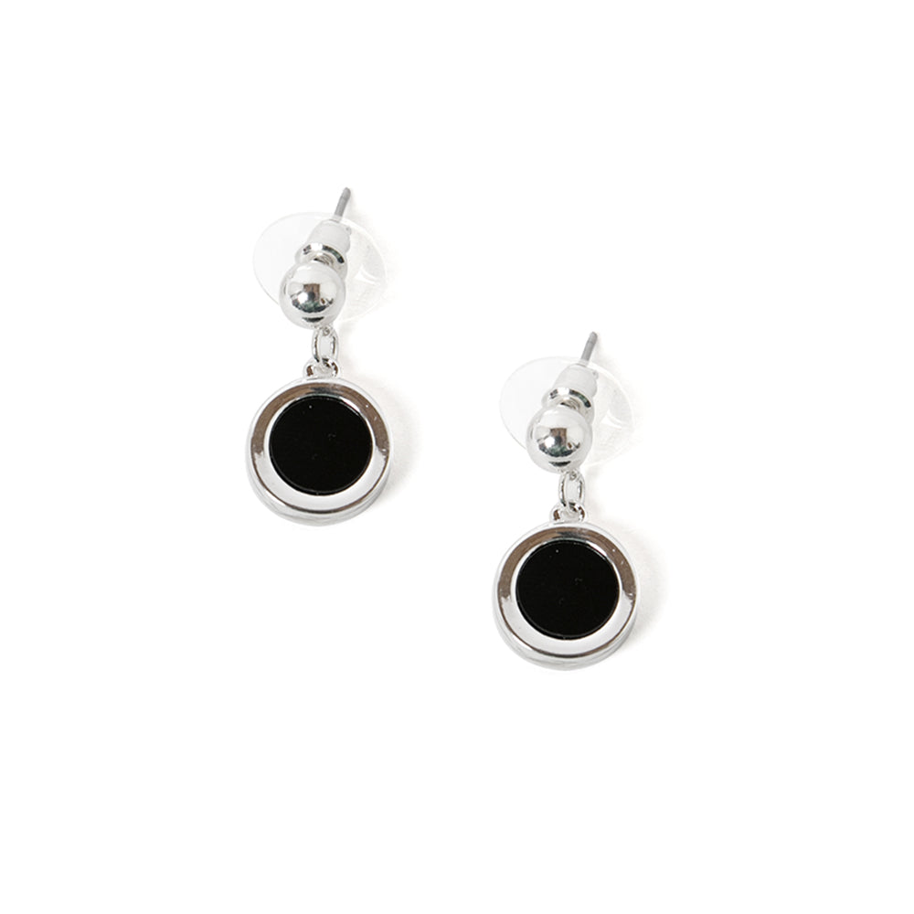 The Jasmine earrings in silver with a black circular pendant in the middle in a droplet shape 