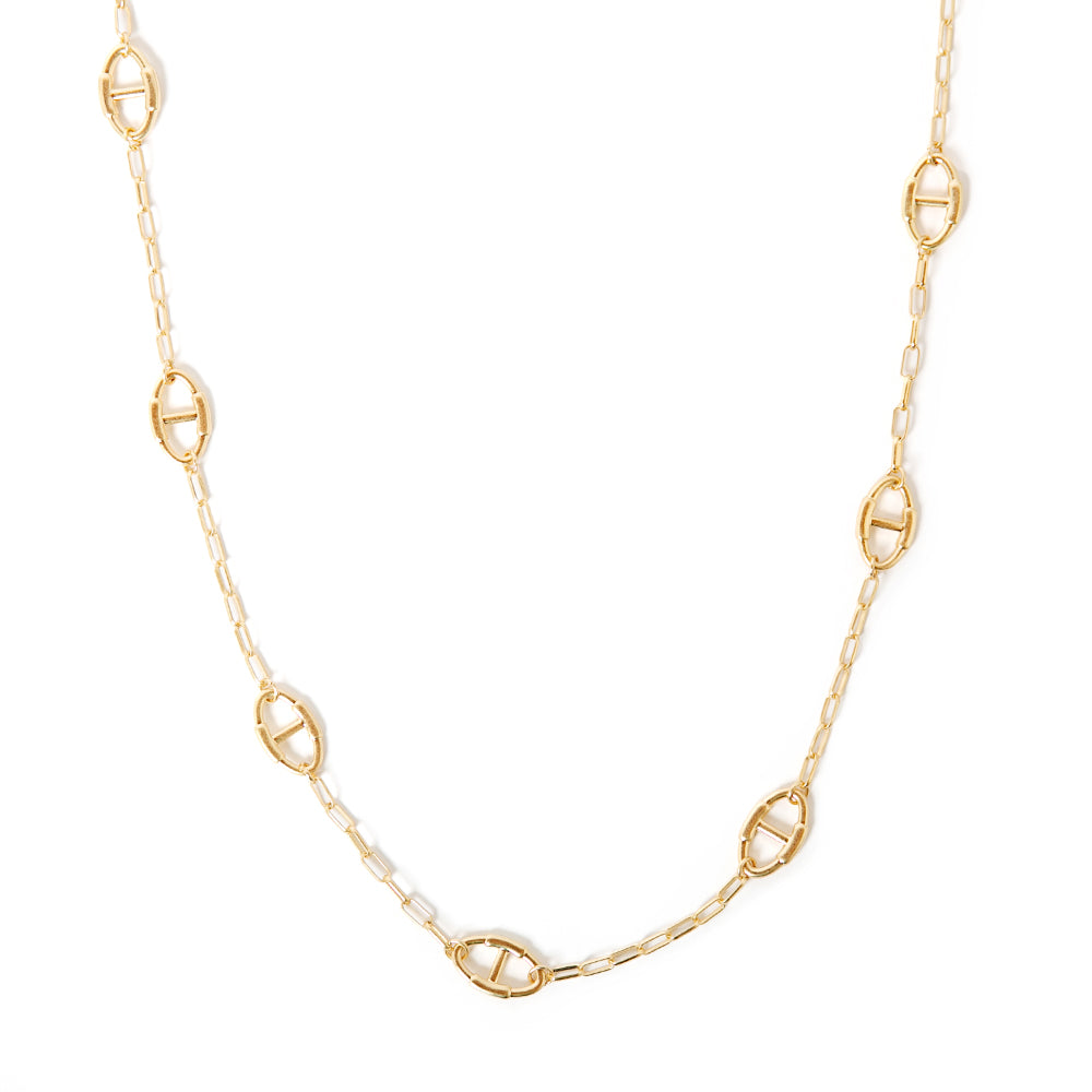 The Juno Long Necklace in gold with oval shaped pendants on a wide link chain that can be adjusted to desired length