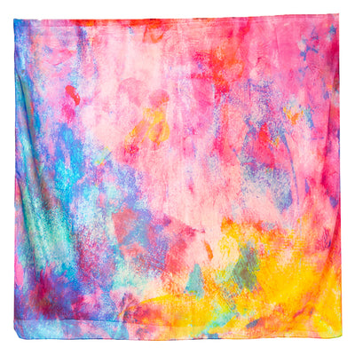 The Kaleidoscope Silk Scarf featuring a gentle brushstroke effect pattern in a rainbow array of colours 