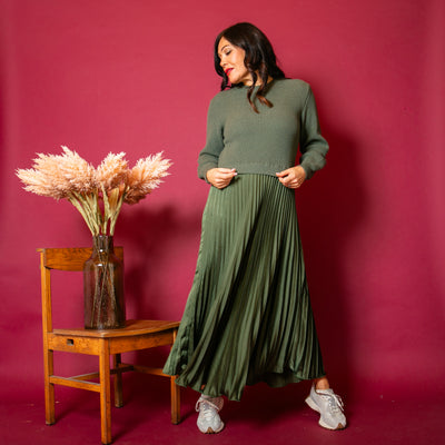 The khaki green Knit And Satin Jumper Dress with long sleeves and a round neckline