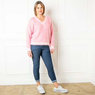 The pink Knitted Prep Sweater with striped detailing around the cuffs, neckline and bottom hemline