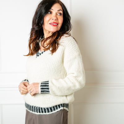 The cream Knitted Prep Sweater made from a blend of nylon, wool and recycled polyester