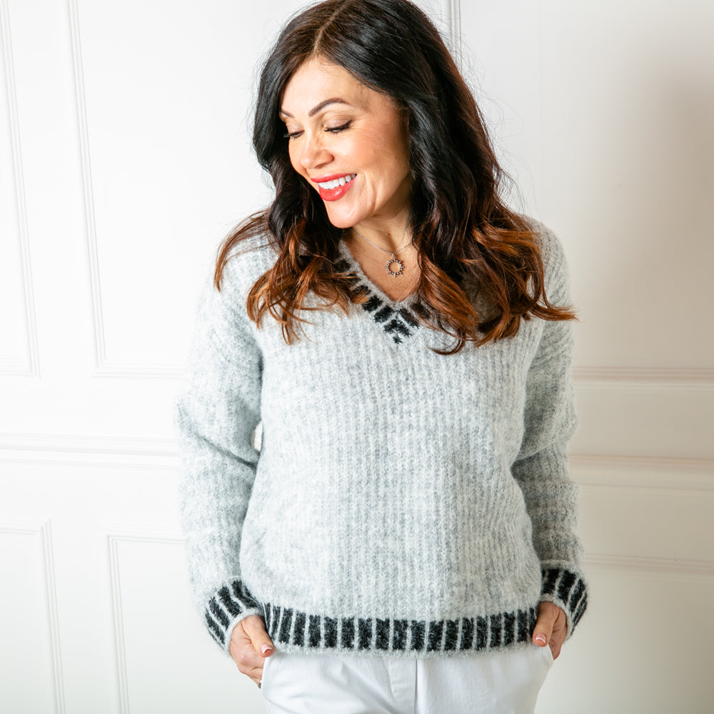 The grey Knitted Prep Sweater with long sleeves and a v neckline 