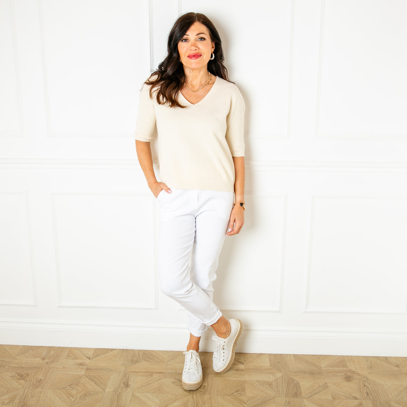 The cream Knitted Short Sleeve Jumper with ribbed detailing on the sleeves and bottom hemline