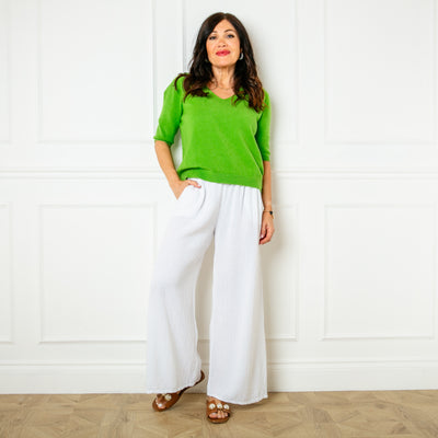 The emerald green Knitted Short Sleeve Jumper with ribbed detailing on the sleeves and bottom hemline
