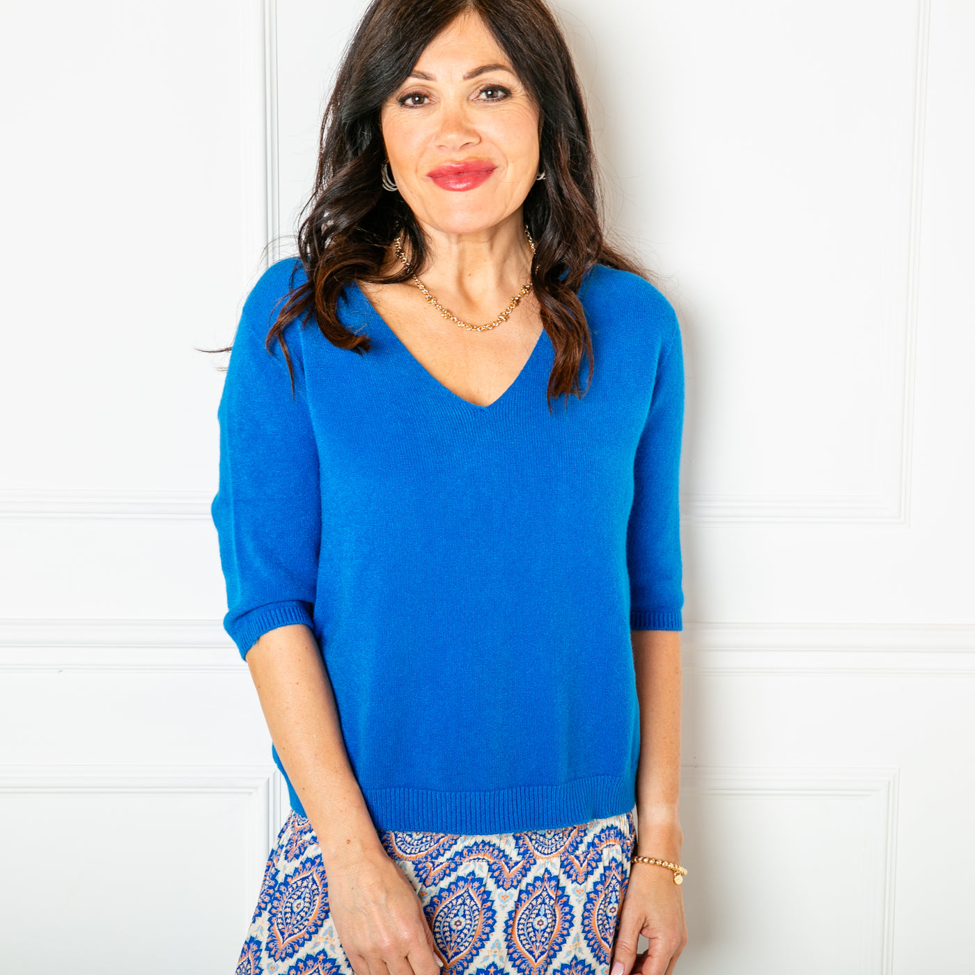 The royal blue Knitted Short Sleeve Top with a v neckline and 3/4 length sleeves