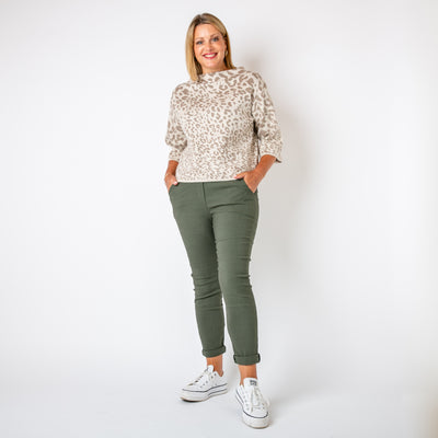 The stone cream Leopard Boxy Jumper featuring a bold animal print pattern