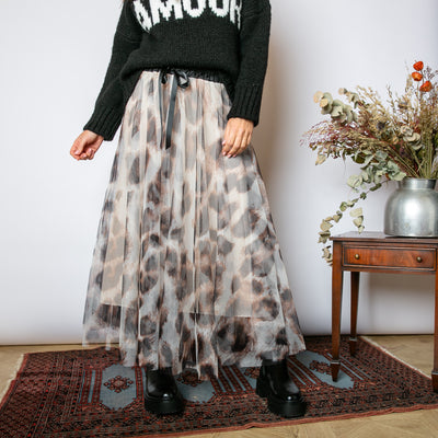 The cream brown Leopard Chiffon Layer Skirt with an elasticated waistband and tie ribbon detail