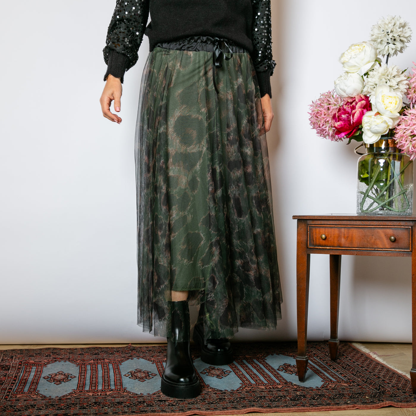 The khaki green Leopard Chiffon Layer Skirt with an elasticated waistband and tie ribbon detail