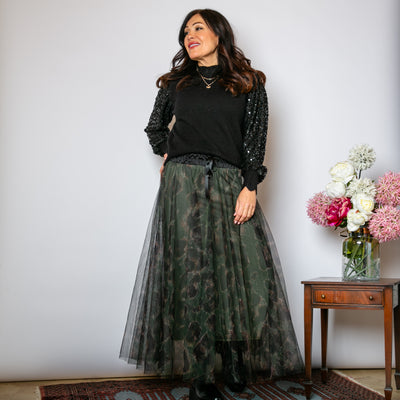 The khaki green Leopard Chiffon Layer Skirt featuring a gorgeous animal print pattern