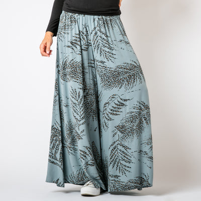 The denim blue Leopard Leaf Wide Leg Trousers featuring a gorgeous animal print leaf feather pattern