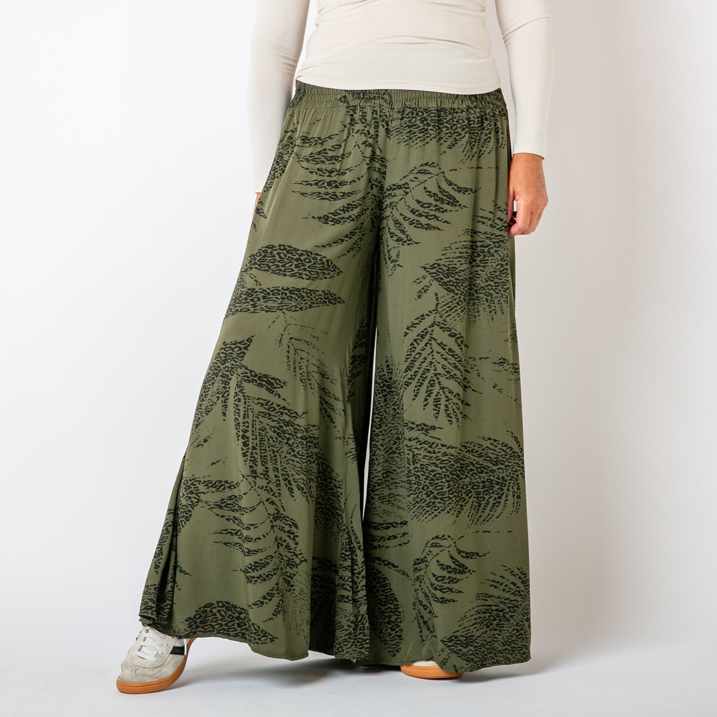 The khaki green Leopard Leaf Wide Leg Trousers featuring a gorgeous animal print leaf feather pattern