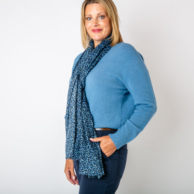 The navy blue Leopard Print Scarf made from a super soft blend of cotton and viscose.