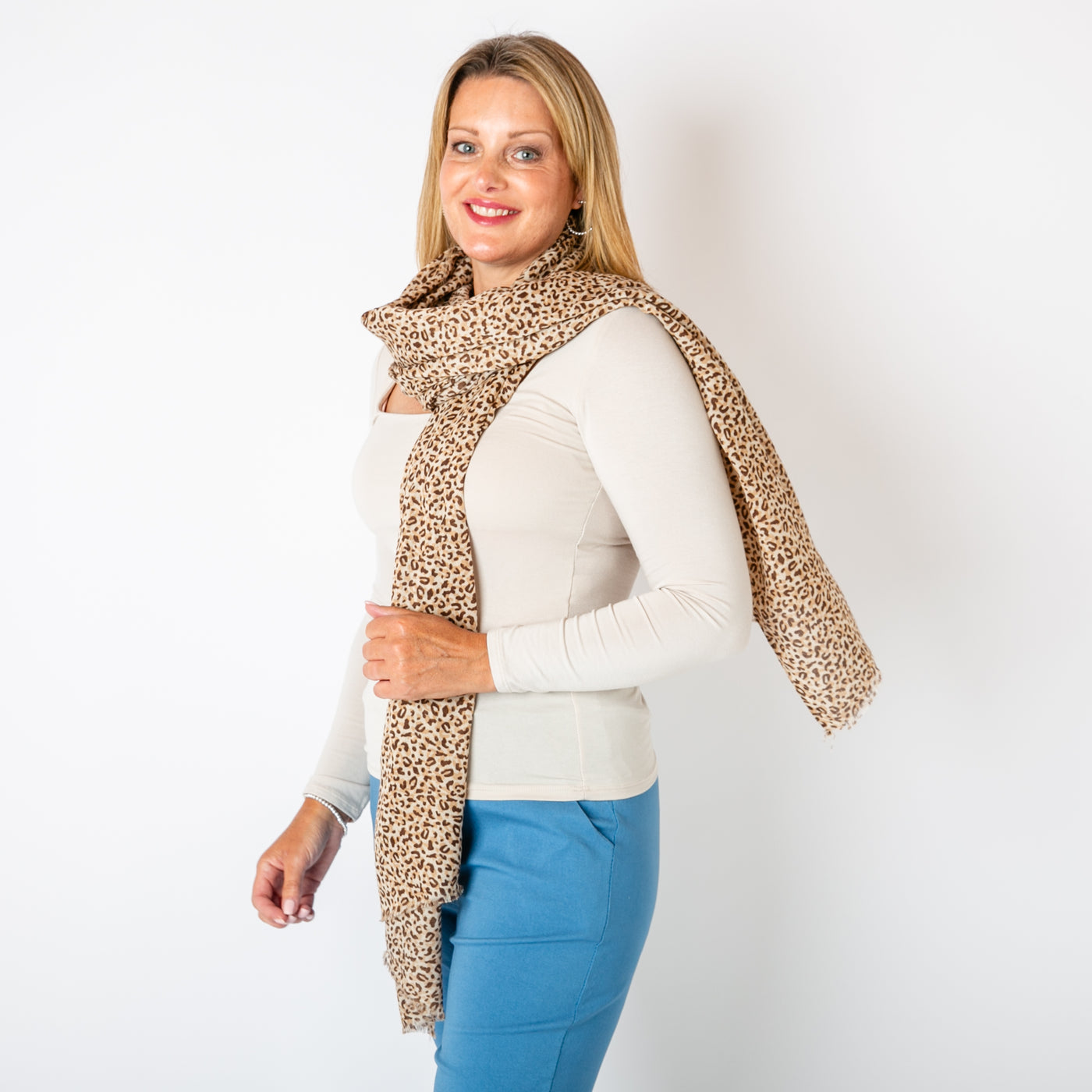 The stone brown Leopard Print Scarf made from a super soft blend of cotton and viscose.