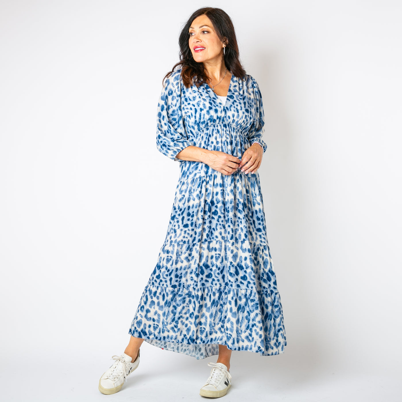 The baby blue Leopard Tiered Dress with a tiered maxi skirt for a relaxed fit