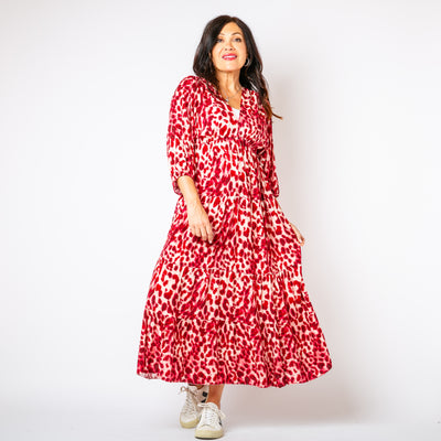 The cherry red Leopard Tiered Dress with a tiered maxi skirt for a relaxed fit