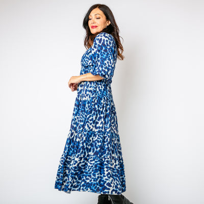 The navy blue Leopard Tiered Dress with a tiered maxi skirt for a relaxed fit