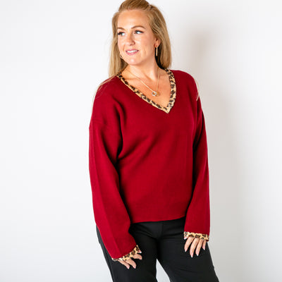 The burgundy red Leopard Trim Jumper made from a blend of wool, nylon and viscose