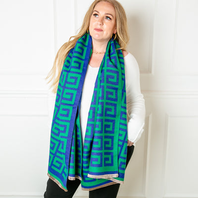 The Libby Pattern Scarf in green and royal blue featuring a fun geometric square swirl print pattern