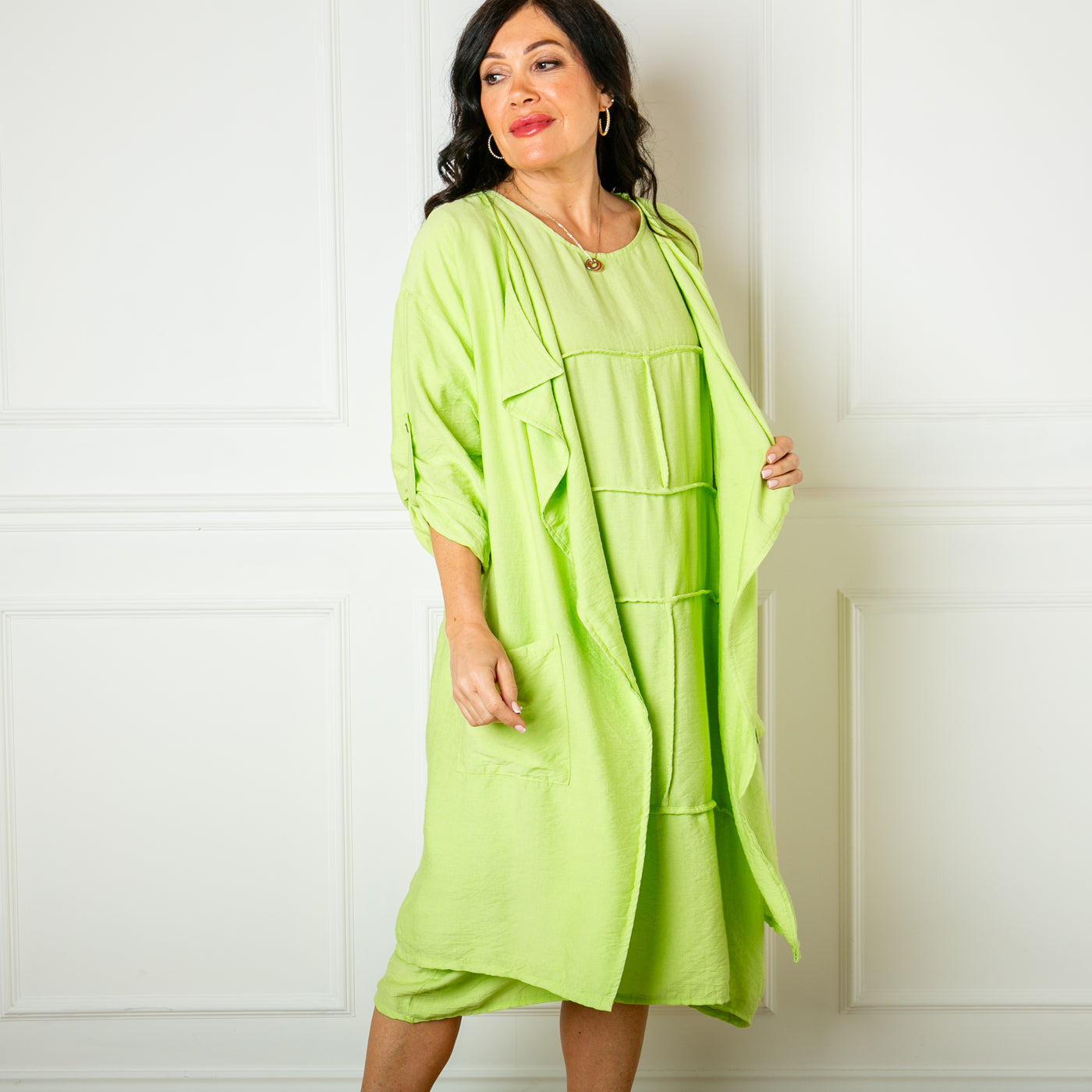 The lime green Lightweight Waterfall Jacket which pairs perfectly with the Handkerchief Vest Top