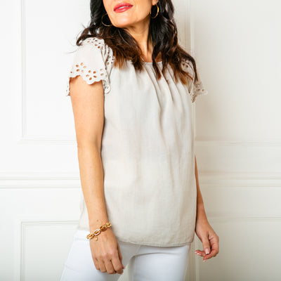 The stone cream Linen Blend Flutter Top with an elasticated bardot neckline so the top can be worn on or off the shoulder