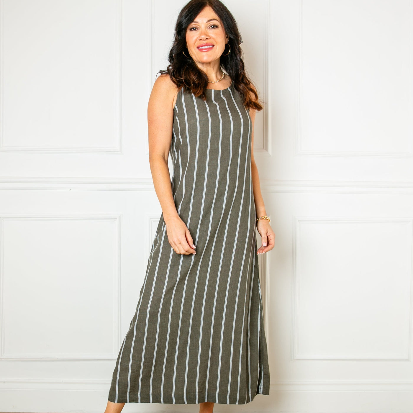 The khaki green Linen Tie Back Maxi Dress, sleeveless with an a-line silhouette and a round neckline