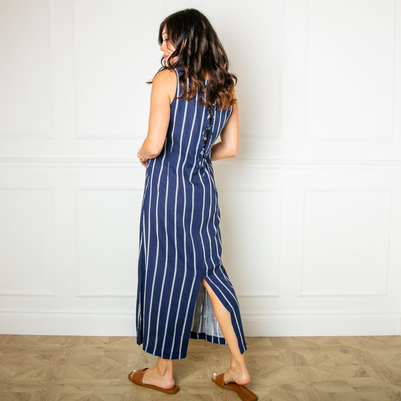 The navy blue Linen Tie Back Maxi Dress featuring gorgeous tie up bow detailing on the back