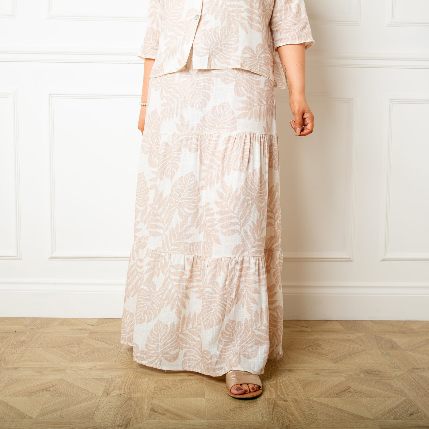 The cream Linen Leaf Tiered Skirt with an elasticated waistband for extra comfort
