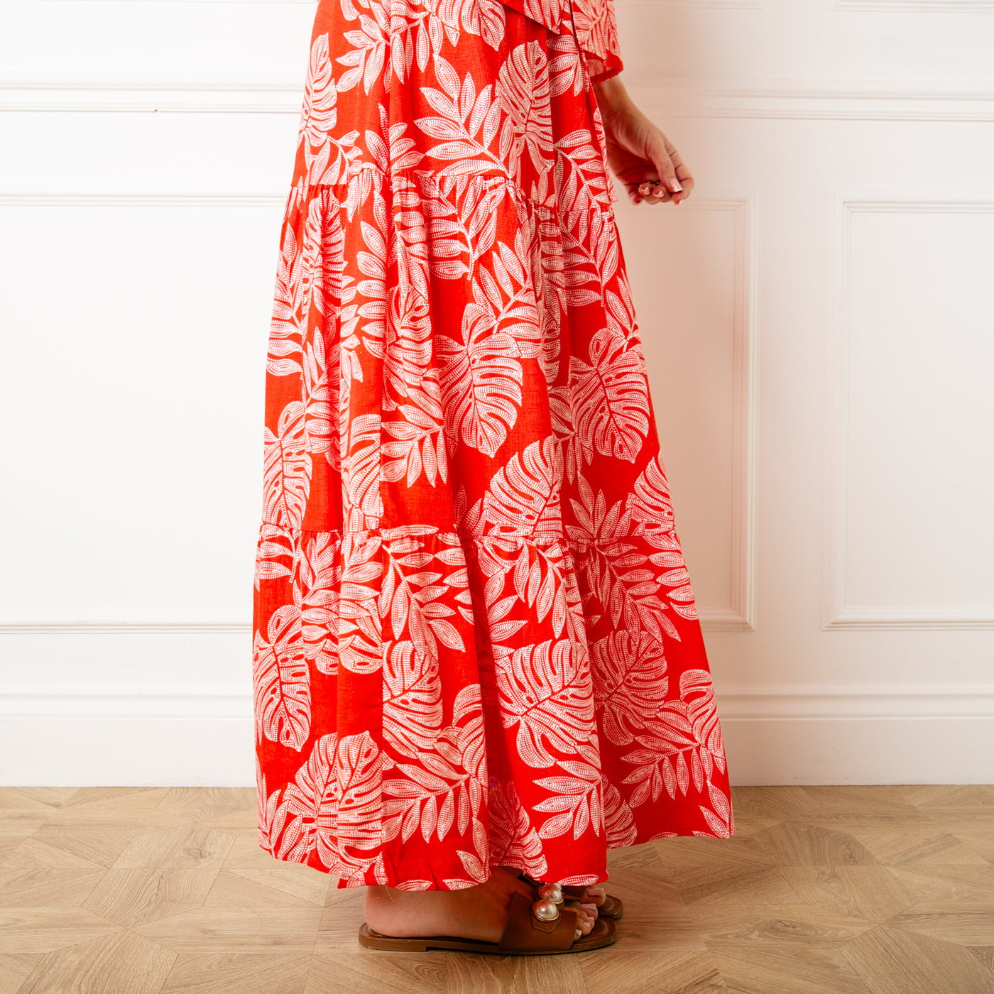 The red Linen Leaf Tiered Skirt with an elasticated waistband for extra comfort