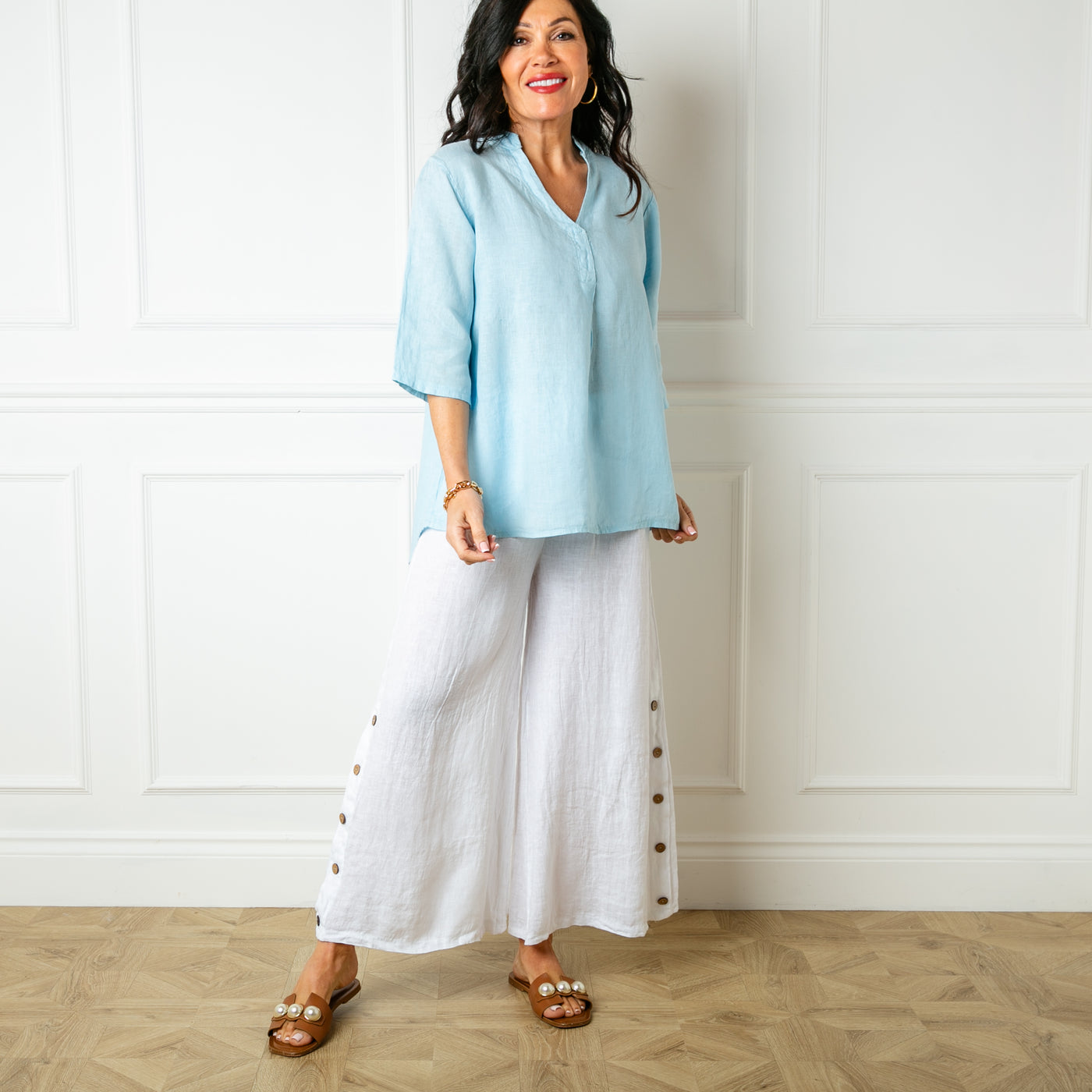 The Linen Tunic Top in baby blue which is perfect for a relaxed summer look 