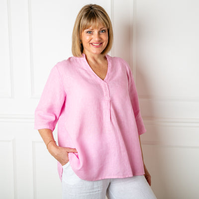 The Linen Tunic Top in pink with 3/4 length sleeves and a collarless v neckline