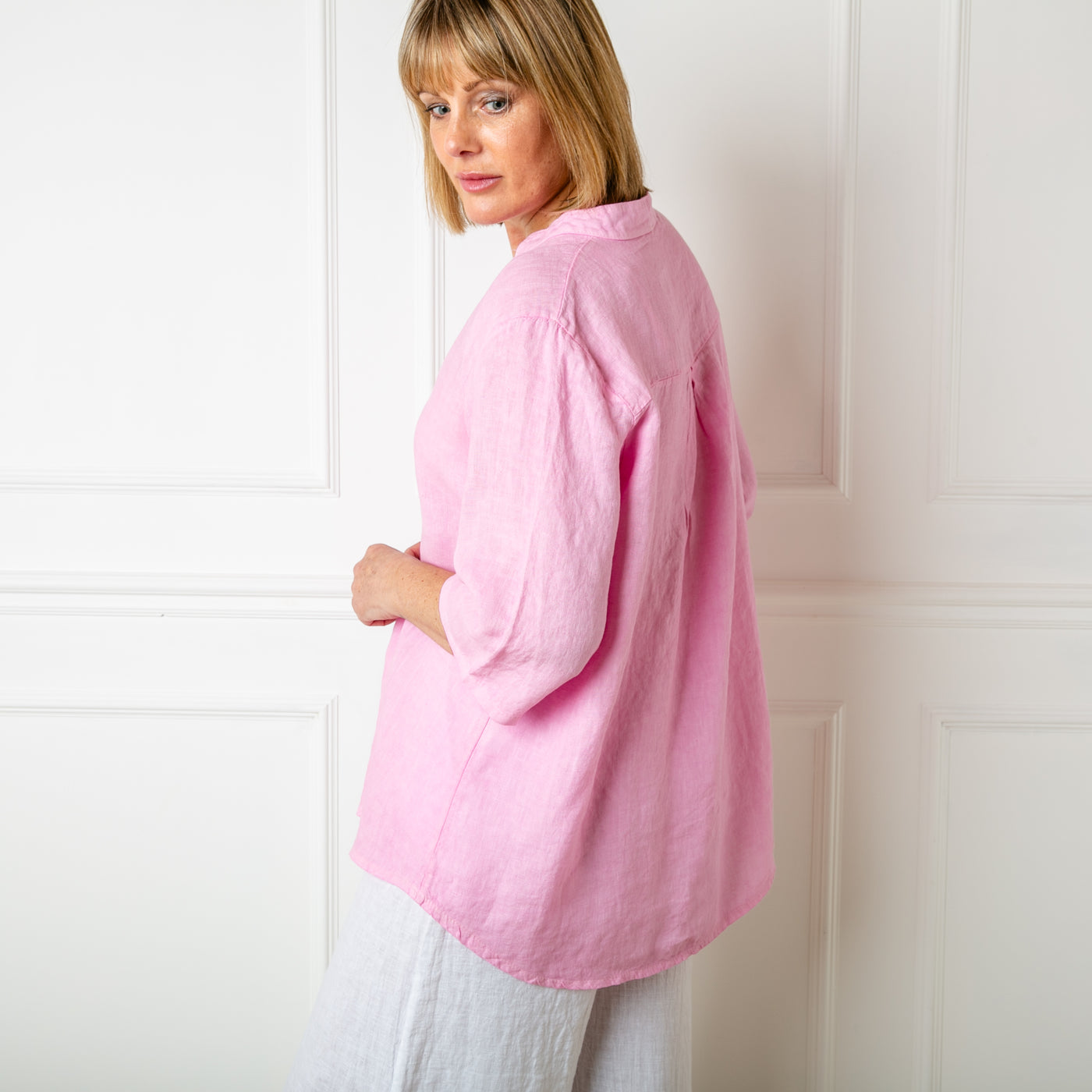 The Linen Tunic Top in pink which is perfect for a relaxed summer look 