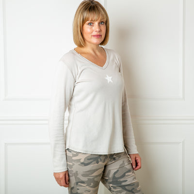 The stone cream Long Sleeve Star Top with a v necklien and full length sleeves