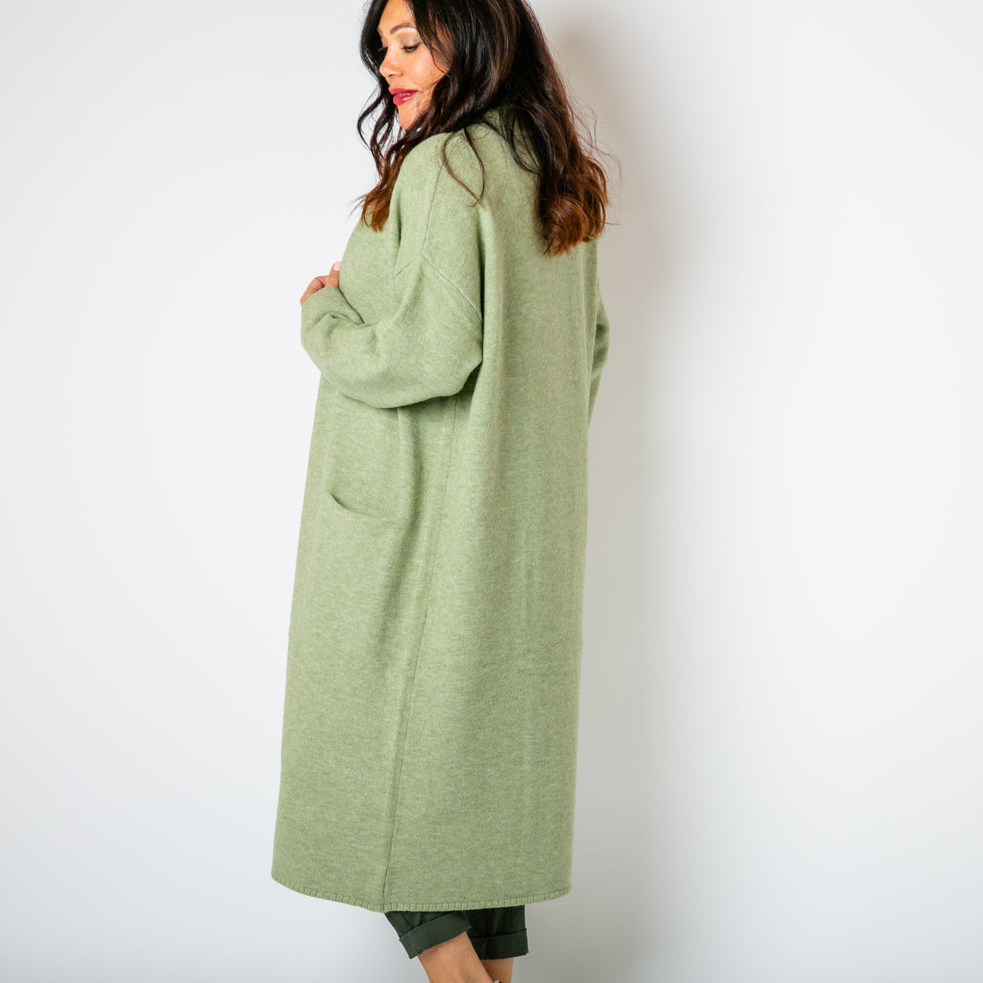 The pistachio green Longline Roll Collar Coatigan with long sleeves and an open front 