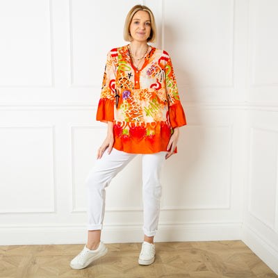 The Los Angeles Top in orange featuring a fun vibrant wild print perfect for brightening up your wardrobe