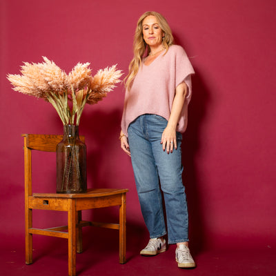 The Blush Pink Mohair Tank Top with a v neckline and a relaxed fit