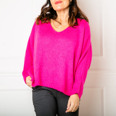 The hot pink Mohair V Neck Jumper with long sleeves and a v neckline