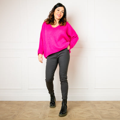 The hot pink Mohair V Neck Jumper, our bestselling jumper, which is great for layering