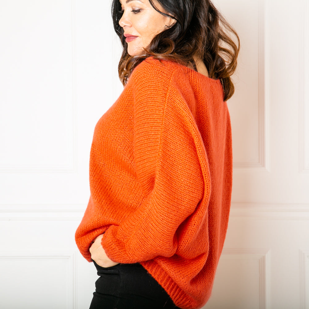 The orange Mohair V Neck Jumper, our bestselling jumper, which is great for layering
