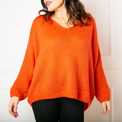 The orange Mohair V Neck Jumper with long sleeves and a v neckline