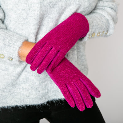 The Mollie Gloves in plum pink which make the perfect finishing touch for any winter outfit