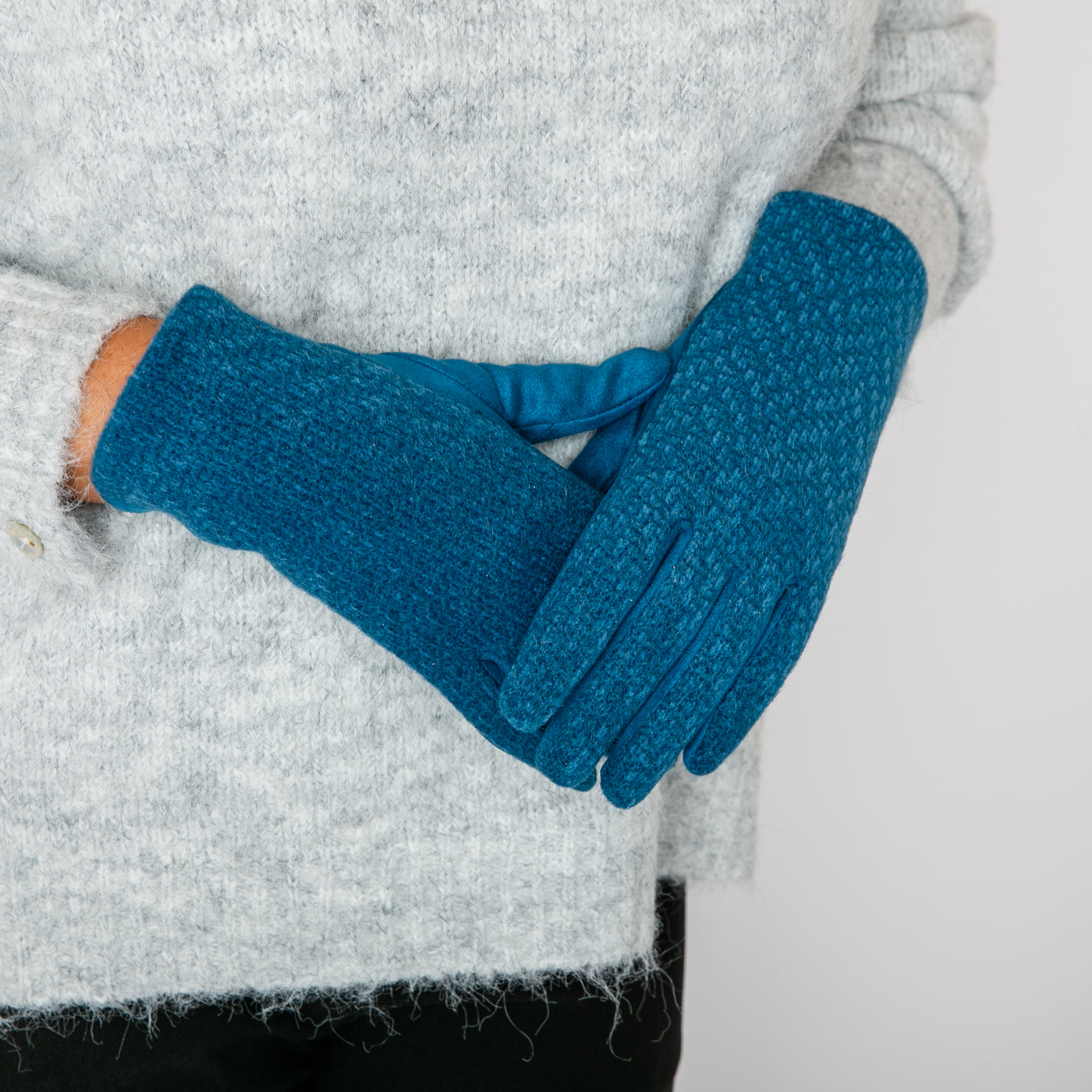 The Mollie Gloves in teal blue which make a great gift for someone special