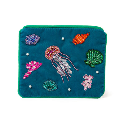 The My Doris Pouch in blue jelly fish beading with beaded trim around the edges